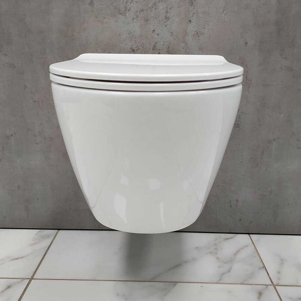 Инсталляция Grohe Solido 38811000 + унитаз Bloomix Trend 1203 безободковый с сиденьем фотография 11