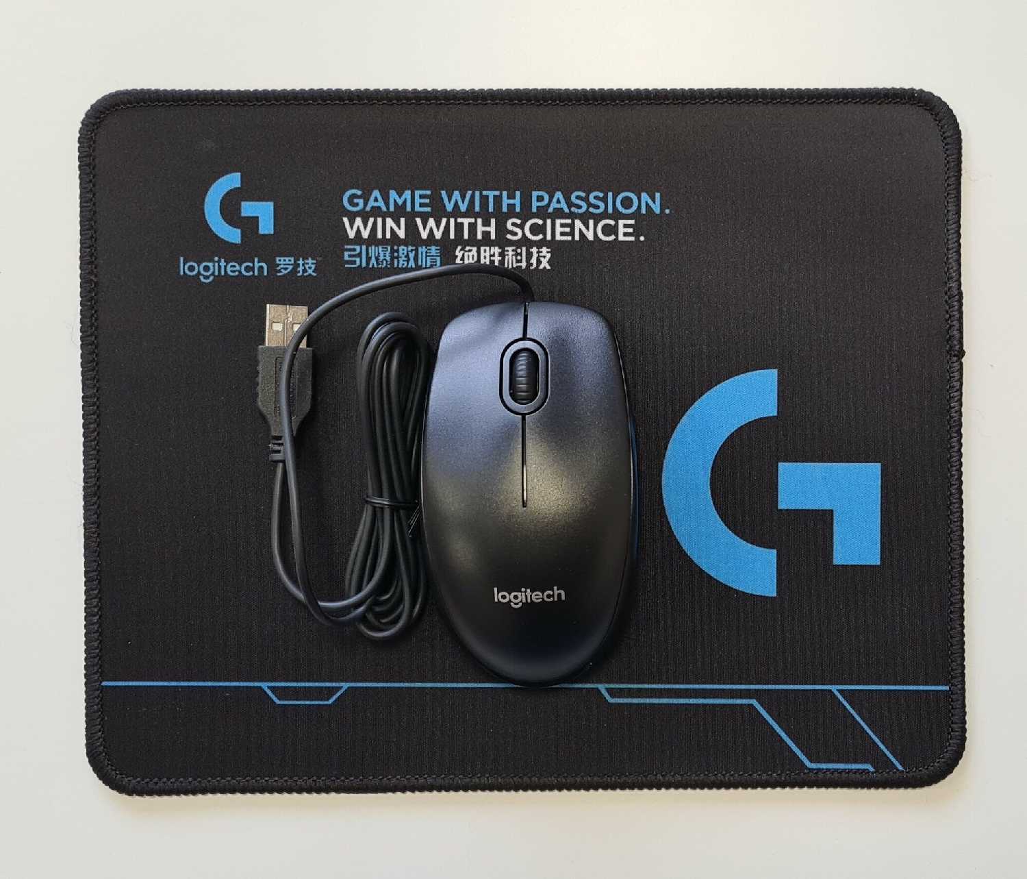 Комплект Logitech Мышь M100r + Коврик фотография 3