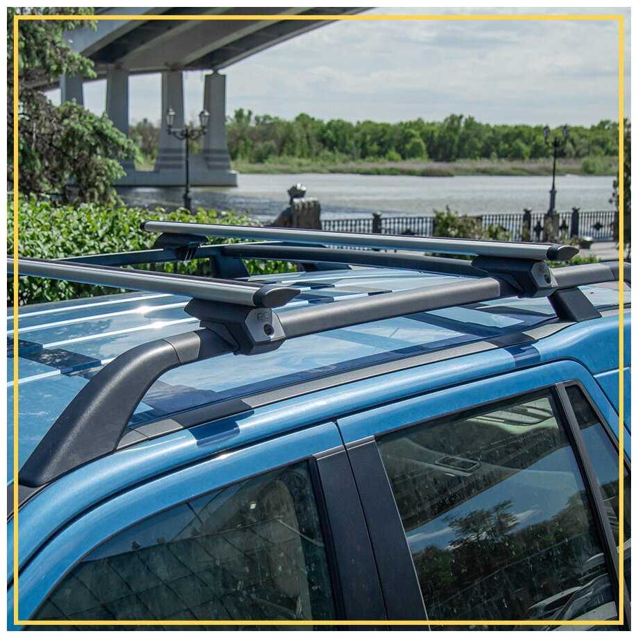 Багажник на крышу на рейлинги Тойота Рав 4 2006-2012/ Toyota Rav 4 2006 - 2012 с крыловидными аэро поперечинами - комплект дуг и креплений фотография 9