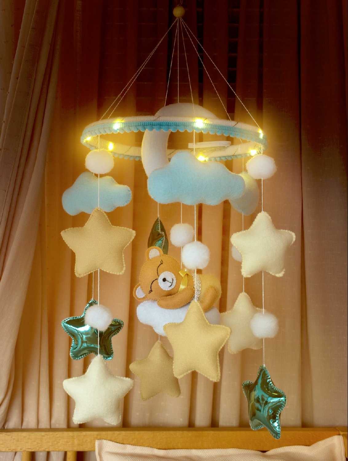 Мобиль в кроватку для новорожденных с подсветкой фотография 10