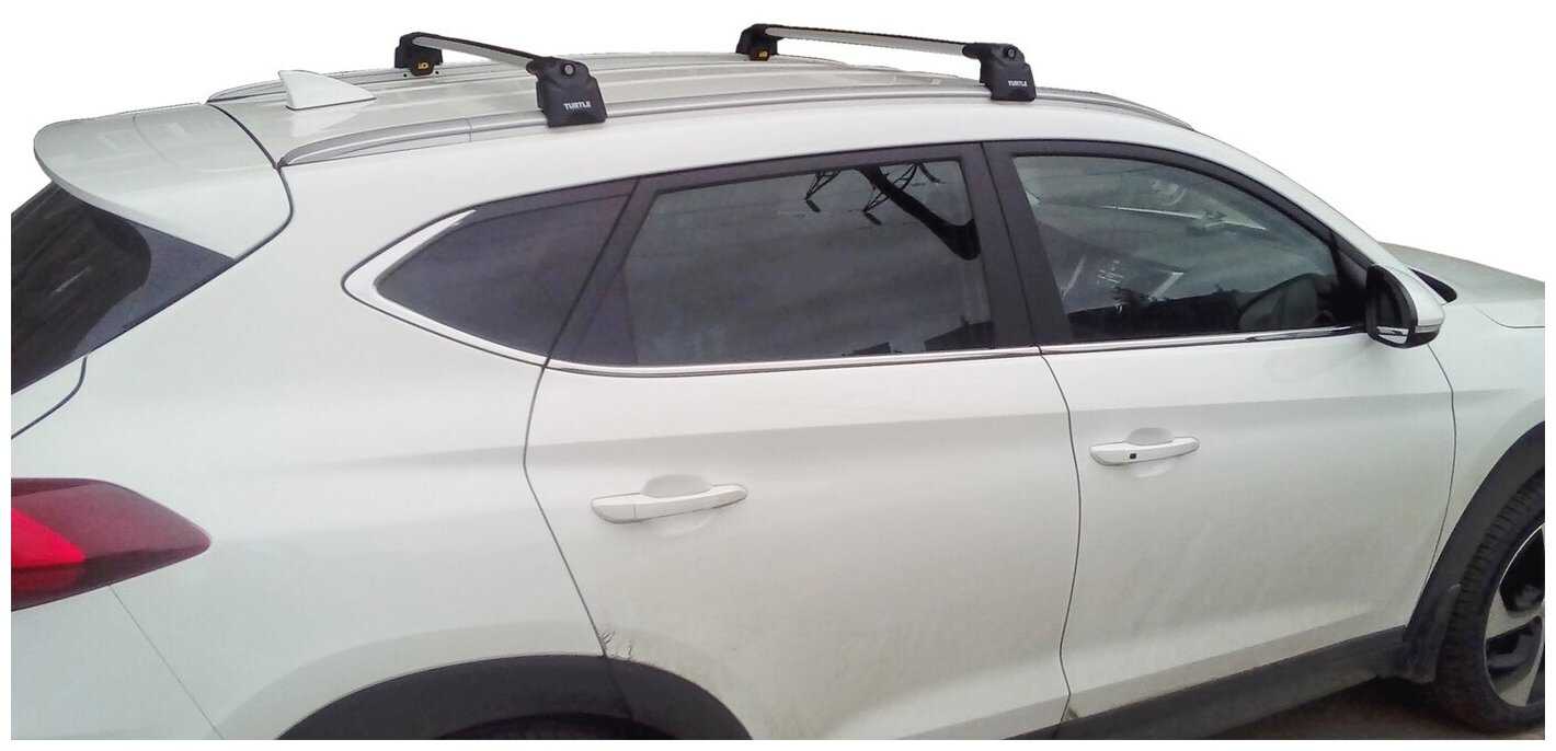 Багажник на Hyundai Tucson TL 2015-2021, на интегрированные рейлинги, Turtle Air 2, серебристый цвет фотография 1