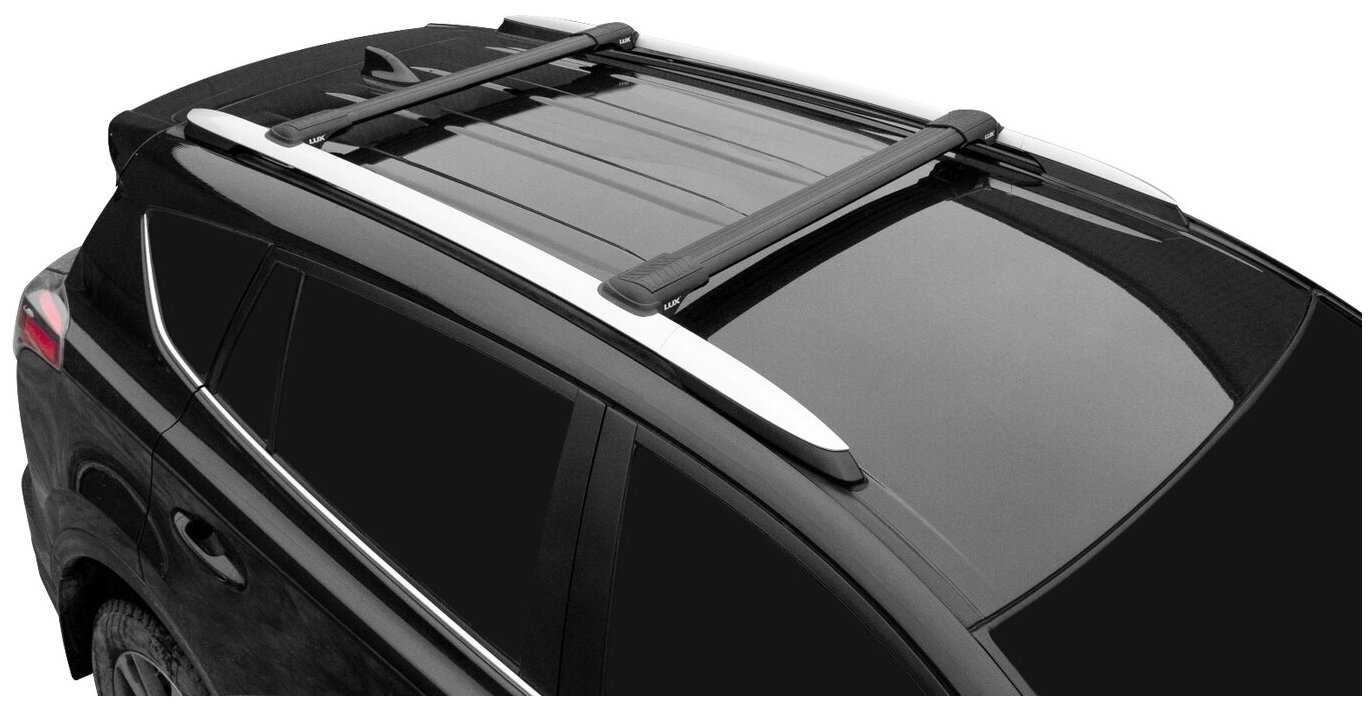 Багажник на рейлинги Mitsubishi Pajero IV 2006-. - Lux Hunter L46-R, черные дуги фотография 2