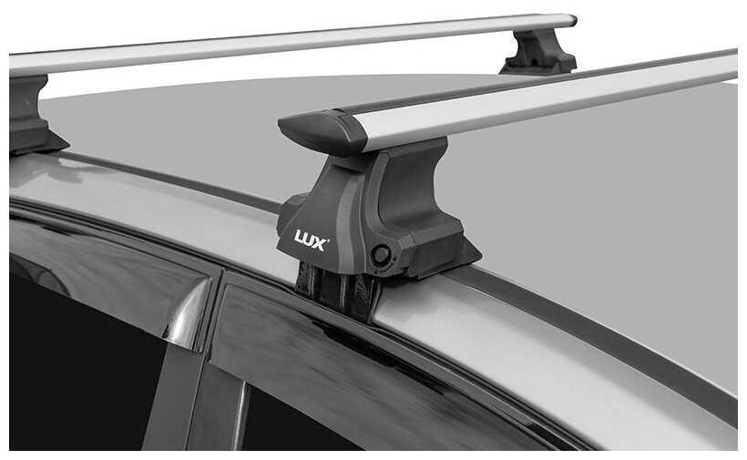 Багажник для Chevrolet Aveo седан 2011-. D-LUX1 с дугами 1,2м аэрокрыло серебристыми фотография 3