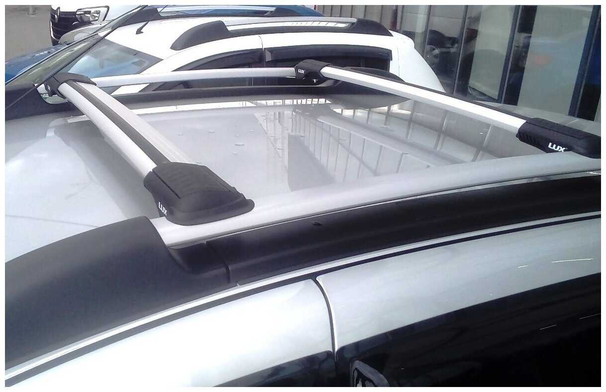 Багажник на рейлинги Subaru Forester 2013-2021 - Lux Hunter L54-R, серебристые дуги фотография 5